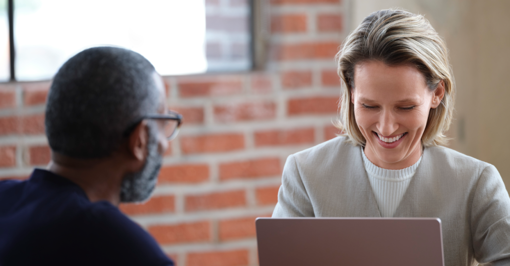 Two people in a meeting