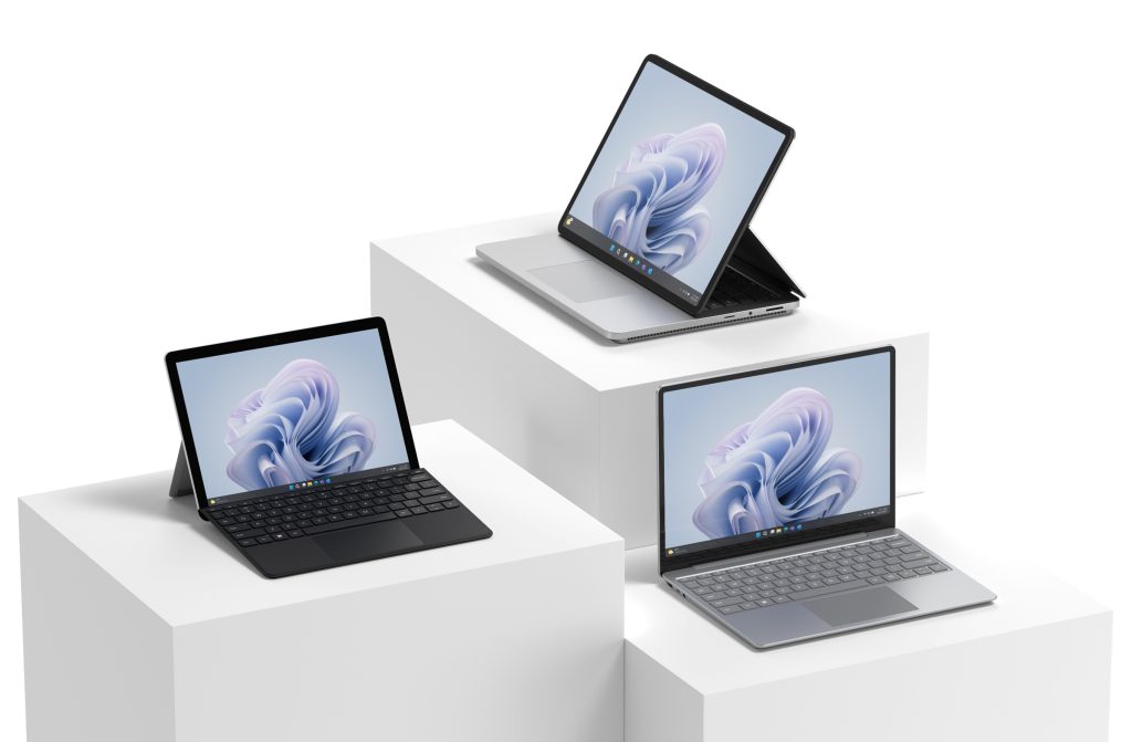 Three Surface laptops on display.